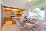 The dining table sits up to four people and features beautiful ocean views